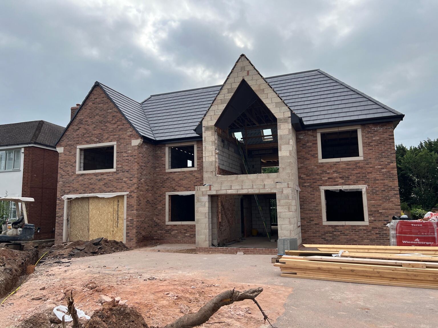 Full two-storey house brickwork under construction